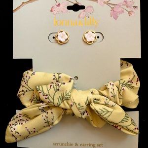 Pink flower stud earrings with matching yellow hair scrunchie